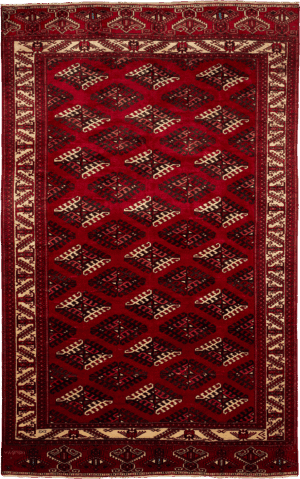Shop this authentic Turkish Milas rug in rich red, with geometric diamond patterns and ornate borders at London Persian Rug Company.